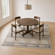 Peris geometric rug beneath a dining set