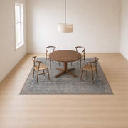 In the room | llynfi oriental area rug beneath a dining set