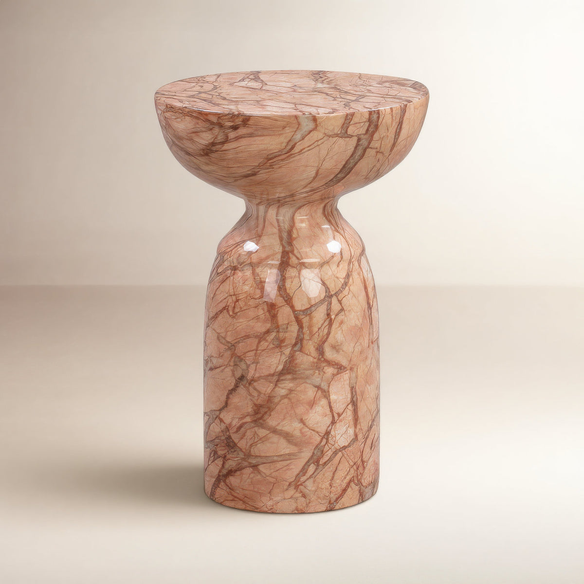 Round End Table in Concrete with Sunset Marble Finish