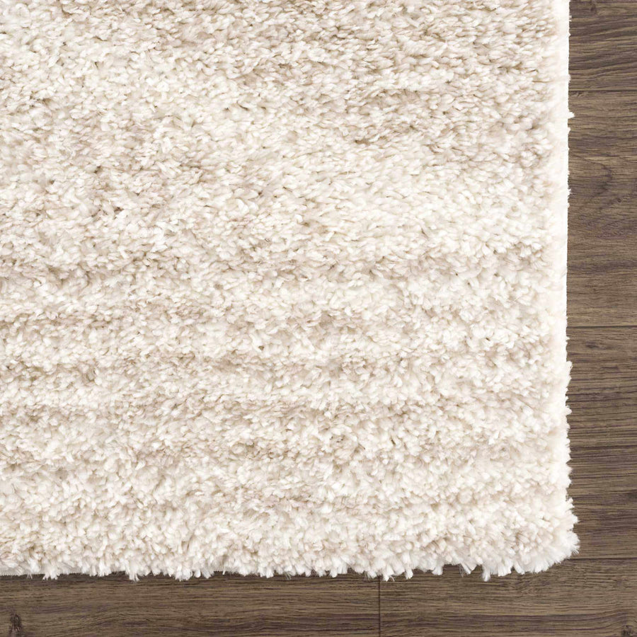 Edge detail | the fringe-free edge and corner shown flat on the floor