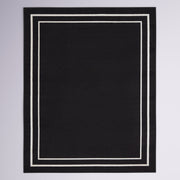Full rug | the whole rug flat on a plain backdrop, no furniture