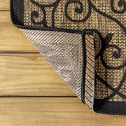 Close up | a folded corner showing the flat weave pile and backing