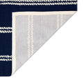 Backing | one corner folded back to show the tufted backing