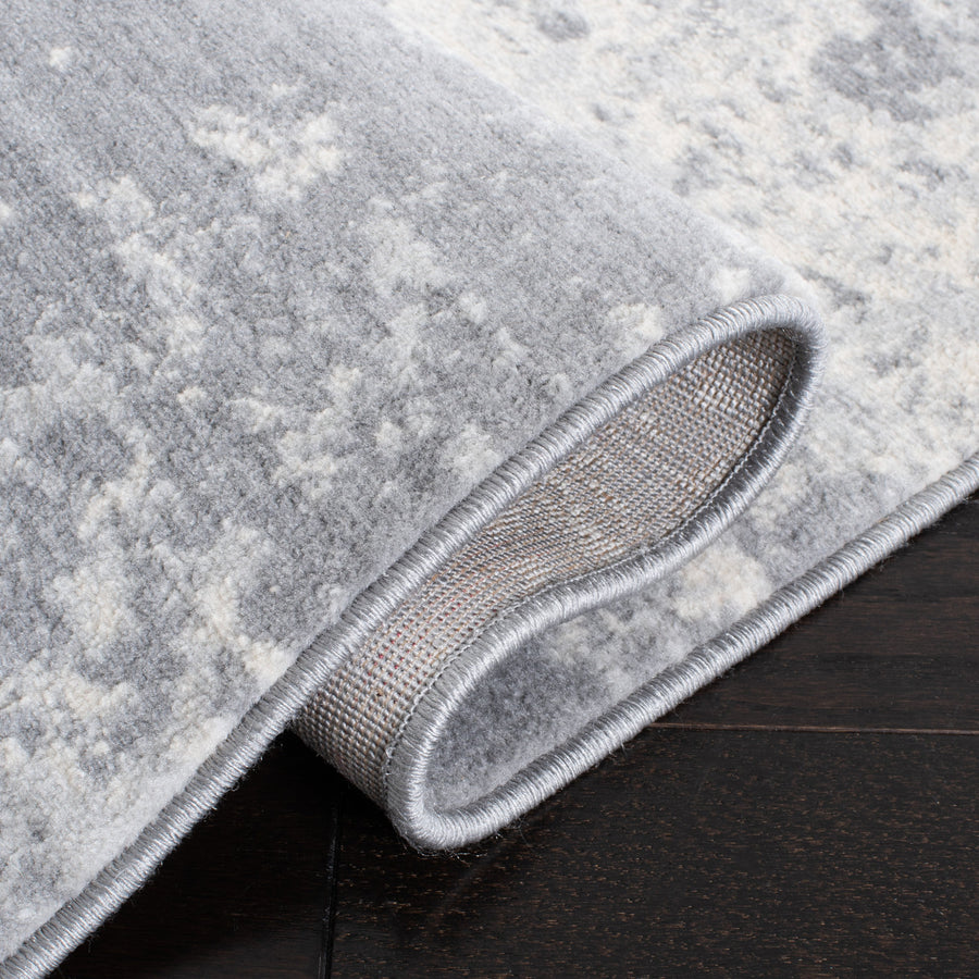 Folded corner | one corner turned back to show the backing