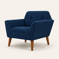 Studio three-quarter | deep navy basketweave armchair showing its flared arm, side panel, two tufted buttons, and pecan birch legs