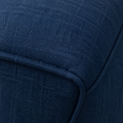 Fabric detail | close view of deep navy polyester basketweave texture and stitched cushion edge