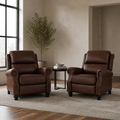 Scale | two reddish-brown push-back recliners beside an uncropped full-height doorway and window reveal, showing room scale