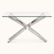 Front | silver pedestal glass dining table centered on paper, rectangular top facing camera