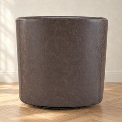 Dark brown faux leather barrel chair, back view