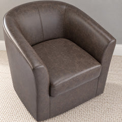 Dark brown faux leather barrel chair, side view