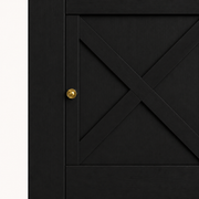 Hardware detail | close-up on one round brass-tone knob and the X-brace door front