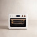 Set Contents | The air fry toaster oven with the included bake pan, air fry basket, wire rack and crumb tray