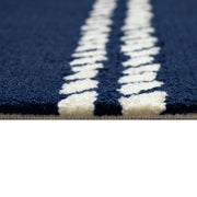 Rope stripe | the ivory rope stripes in relief against the navy pile