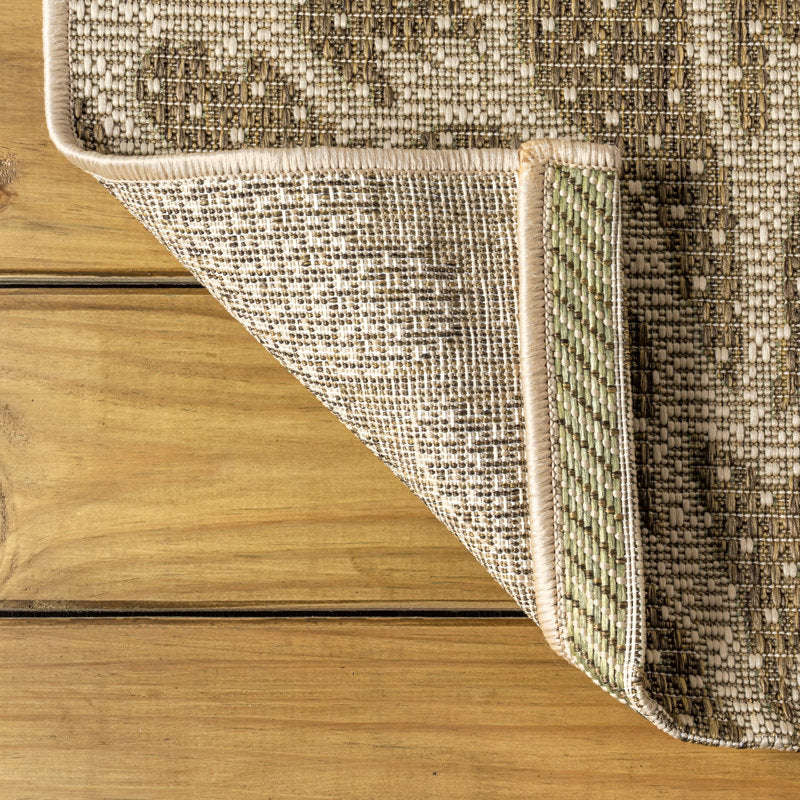 Folded corner | one corner turned back to show the backing and weave