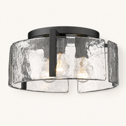 Front | studio front of the matte black drum and hammered glass panels
