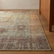 Angle | Teifi rug from the corner, jade field inside a rust and plum border