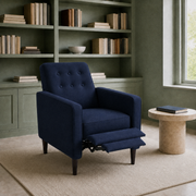 Sage library | dark blue manual recliner with extended footrest beside a stone side table