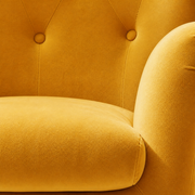 Texture | close view of mustard velvet nap, diamond stitching, covered buttons, and seat cushion