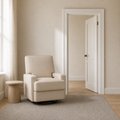 Scale | beige velvet swivel reclining glider beside a full-height interior doorway for scale