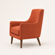 Studio side | Side profile of burnt-orange armchair showing its sloped arm, tight back, depth, and tapered wood legs