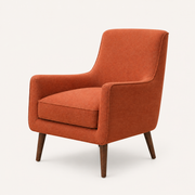 Studio three-quarter | Burnt-orange woven armchair showing the full near arm, side rail, piped cushion, and tapered wood legs
