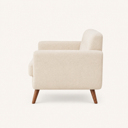 Side | Studio profile view of the square arm and splayed wood legs