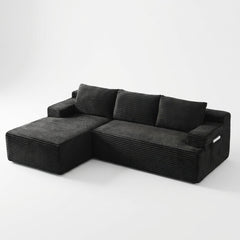 Front | Black corduroy sectional on a white studio backdrop with the chaise on the left