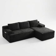 Right facing | Black corduroy sectional on white with the chaise on the right and the pocket on the left arm