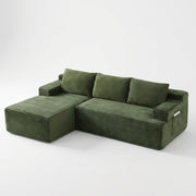 Green | Deep olive corduroy sectional on a white studio backdrop with the chaise on the left