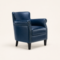 Studio angle | Left three-quarter view of the navy faux leather armchair