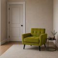 Scale | olive-green velvet armchair beside a fully visible floor-to-lintel doorway in a neutral interior for scale