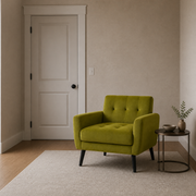 Scale | olive-green velvet armchair beside a fully visible floor-to-lintel doorway in a neutral interior for scale