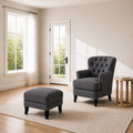 Scale | dark gray armchair and ottoman beside a full-height doorway and window for scale