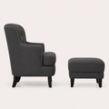Side | side studio profile showing the chair back slope, arm, and matching ottoman