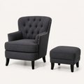 Studio | three-quarter studio view showing the chair profile, nailhead trim, and matching ottoman