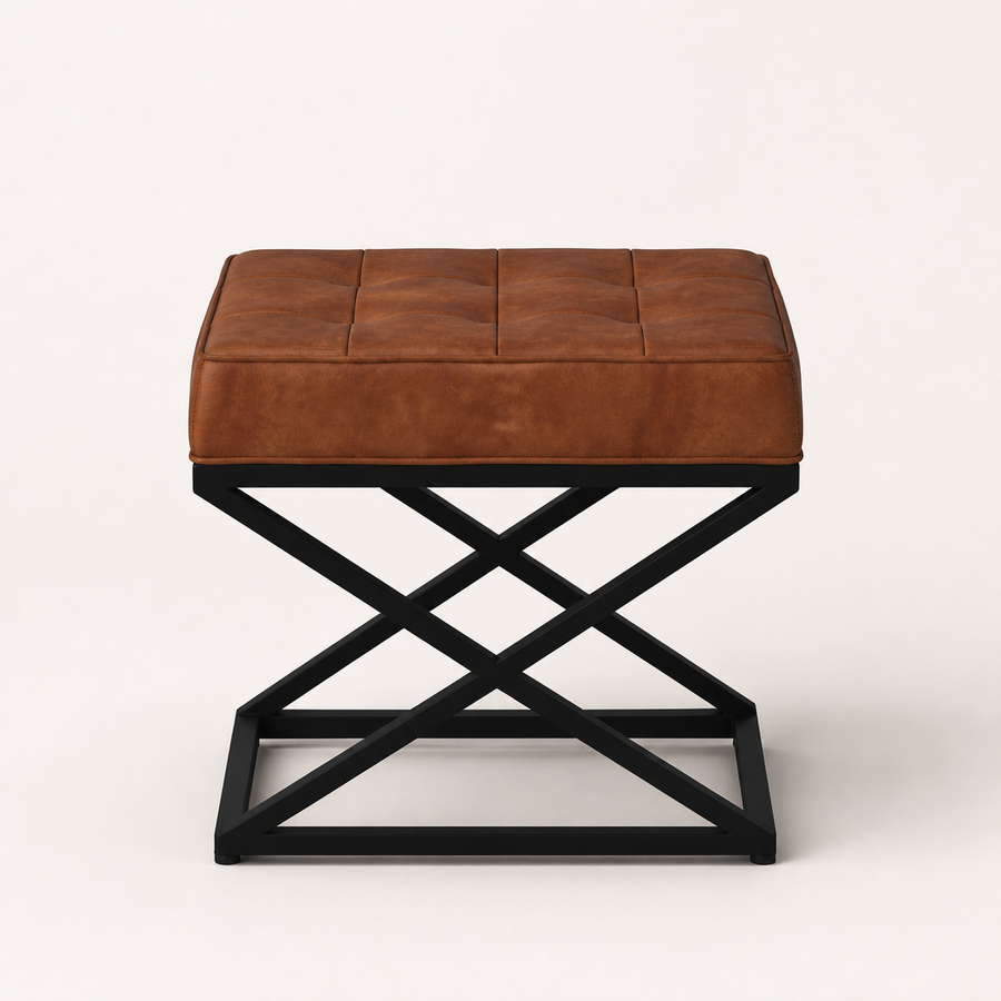 Front | saddle tan top-grain leather ottoman with twelve stitched top panels and black square-tube X-base