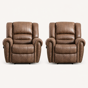 Front | two matching Nut Brown faux leather recliners on an off-white studio sweep with rolled arms, brass nailheads, and black feet
