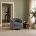 Scale | slate gray swivel barrel chair beside an uncropped full interior doorway for scale