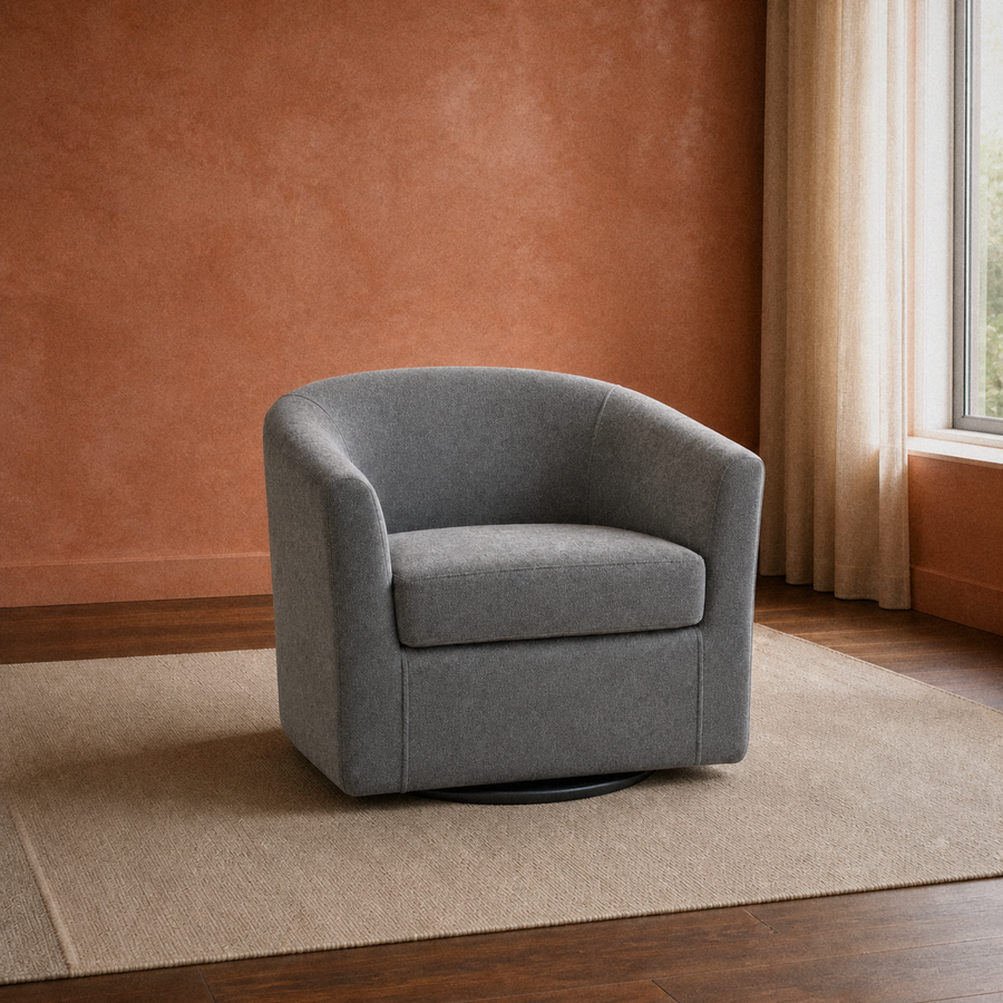 In a room | terracotta living room with the slate gray swivel barrel chair on a plain oatmeal rug beside a curtained window
