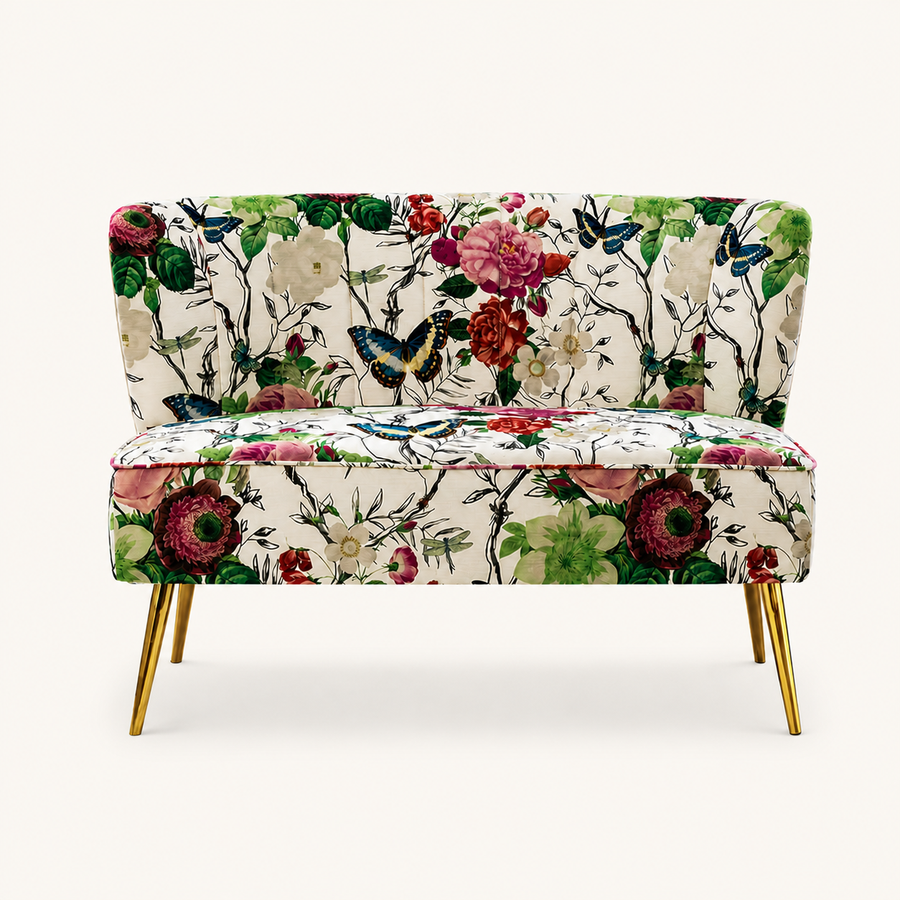 Front | front view of the ivory floral armless loveseat with blue-and-yellow butterflies and gold legs