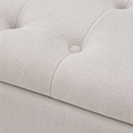 Texture | close view of ivory textured upholstery, deep tufting, stitching, and one covered button