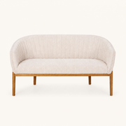 Front | straight-on studio view of the beige channel-back loveseat with brown wood legs