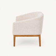 Side | right side studio profile showing the loveseat back curve, arm depth, and wood legs