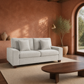 Room | Beige-gray chenille compact sofa in a terracotta garden room with walnut table and arched door