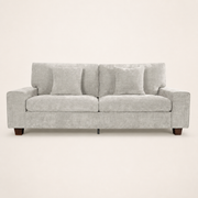 Studio | Straight-on view of the beige-gray chenille sofa with square arms, two pillows, and brown wood legs