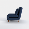 Studio side | navy blue convertible chair in true side profile showing its deep seat, folding seam, upholstered back, and espresso pine legs