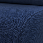 Close view | solid navy blue plain-weave upholstery and rounded seat-edge seam