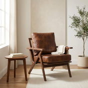 Tessmar wood frame faux leather lounge chair styled in a Tloom reading corner