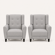 Front | two light gray linen-blend armchairs with button-tufted backs and dark tapered legs
