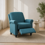 Reclined view | Caribbean Blue recliner with the footrest extended in a warm white living room
